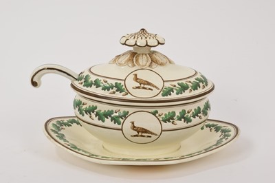 Lot 130 - Wedgwood Queensware crested sauce tureen, cover and fixed stand, circa 1800, and a ladle