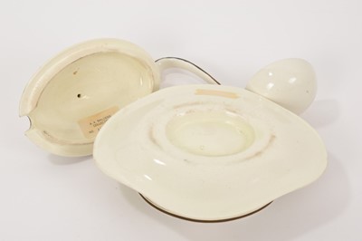 Lot 130 - Wedgwood Queensware crested sauce tureen, cover and fixed stand, circa 1800, and a ladle