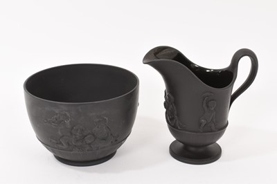 Lot 135 - Wedgwood black basalt helmet shaped jug and matching round bowl circa 1790-1800