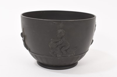 Lot 135 - Wedgwood black basalt helmet shaped jug and matching round bowl circa 1790-1800