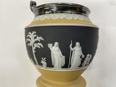 Lot 80 - Two Wedgwood jasper biscuit barrels, with plated mounts