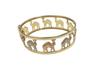 Lot 41 - Italian 18ct three colour gold hinged bangle with camel design
