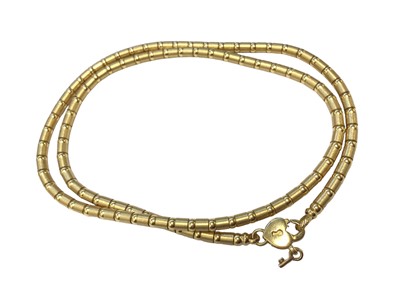 Lot 42 - Zancan 18ct gold chain with tubular links and a key and padlock clasp