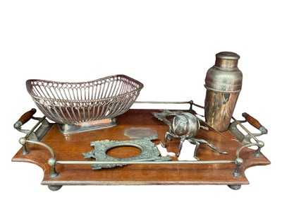 Lot 119 - Edwardian oak and metal mounted twin handled tray, with presentation plaque and group of silver plate