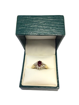 Lot 44 - 18ct gold ruby and diamond cluster ring