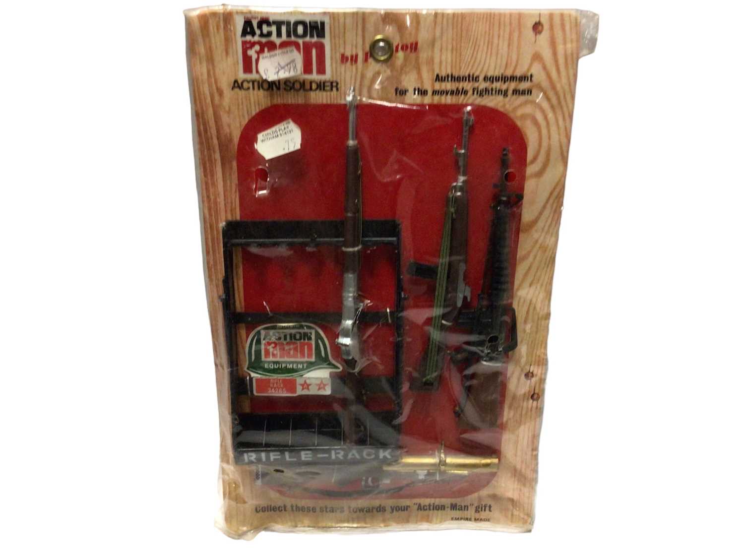 Lot 8 - Palitoy Action Man early Rifle Rack No.34265 & Camoflage Helmet, on wood frame card with cellophane outer packaging (2)