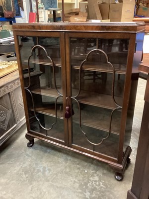 Lot 1276 - 1930s mahogany display cabinet with shaped glazed doors enclosing adjustable shelves on cabriole legs 87cm wide, 108cm high, 27cm deep