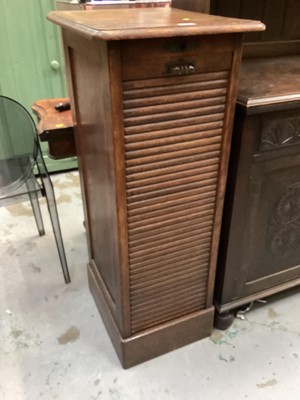 Lot 1293 - Edwardian oak narrow filing init / music cabinet with tambour shutter enclosing shelves