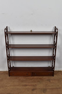 Lot 1327 - Chippendale style hanging bookshelves with two drawers below and fretwork ends