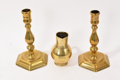 Lot 786 - Pair of Queen Anne brass candlesticks, together with 18th century bell metal jug