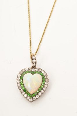 Lot 425 - A fine late Victorian opal diamond and green garnet heart shape pendant on chain