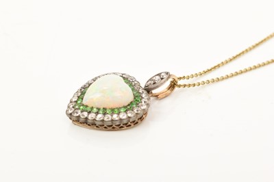 Lot 425 - A fine late Victorian opal diamond and green garnet heart shape pendant on chain