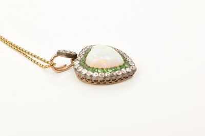 Lot 425 - A fine late Victorian opal diamond and green garnet heart shape pendant on chain