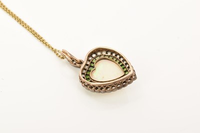 Lot 425 - A fine late Victorian opal diamond and green garnet heart shape pendant on chain