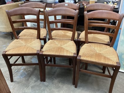 Lot 1299 - Six 19th century rush seated country dining chairs with ladder backs