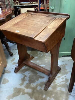 Lot 1311 - Victorian walnut and pine school desk