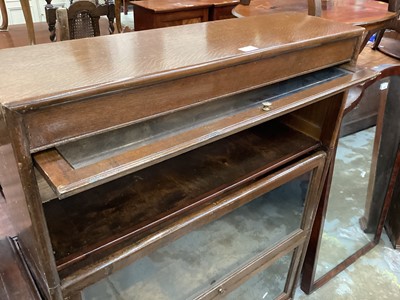Lot 1323 - Oak three tier stacking bookcase with glazed doors 117cm high, 87cm wide, 25cm deep and childs desk  and chair