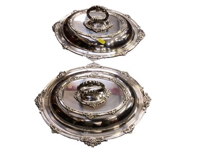 Lot 677 - Pair of plated serving dishes with lids and pair of three branch candelabra with pewter tea set, cash box brass and other plated ware (qty)