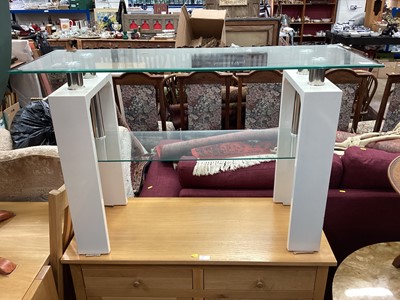 Lot 1331 - Contempory oak extending dining table, four chairs, sideboard and modern glass and metal framed side table