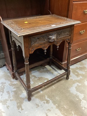 Lot 1340 - Carved oak hall table with drawer on turned legs 66cm wide