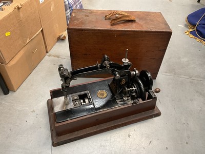 Lot 432 - Vintage Wheeler & Wilson sewing machine in wooden case.