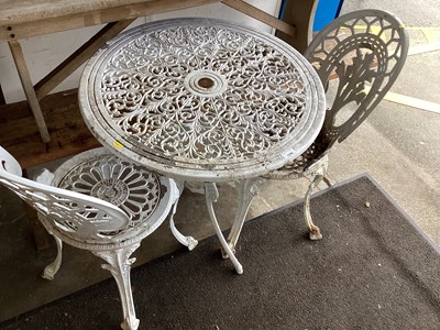 Lot 1356 - Cast metal garden table and pair of similar chairs