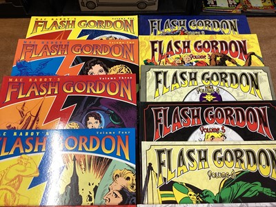 Lot 90 - Dark Horse Comics Softback Mac Raboy's Flash Gordon Vol 1-4 (2003) together with Alex Raymond Hardback Flash Gordon Vol 1-7 (2005) Books