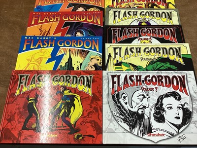 Lot 90 - Dark Horse Comics Softback Mac Raboy's Flash Gordon Vol 1-4 (2003) together with Alex Raymond Hardback Flash Gordon Vol 1-7 (2005) Books