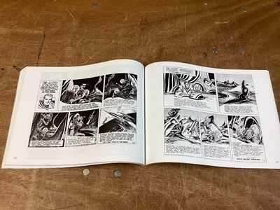 Lot 90 - Dark Horse Comics Softback Mac Raboy's Flash Gordon Vol 1-4 (2003) together with Alex Raymond Hardback Flash Gordon Vol 1-7 (2005) Books