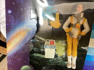 Lot 133 - Madelman (1980-1983) Cosmic Investigadora Espacial 6 1/2" action figure with yellow & white space suit, in window box Ref: 902 (1)