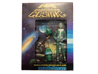 Lot 134 - Madelman (1980-1983) Cosmic Hombre Verde 6 1/2" action figure with green space suit, in window box Ref: 903 (1)