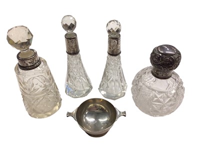 Lot 1084 - Scottish silver quaich of small proportions, together with four silver mounted glass scent bottles