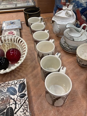 Lot 486 - Wedgwood Millennium mug, limited edition no. 76 of 500 designed by Richard Guyatt, together with a set of six church heritage design mugs.