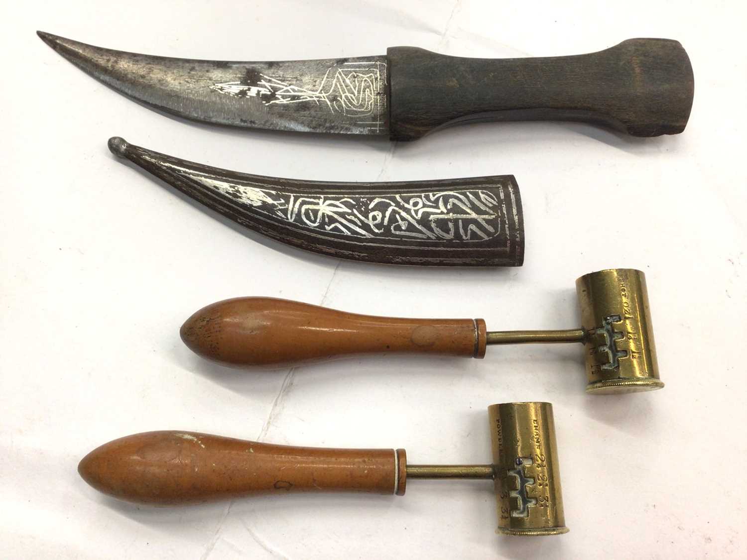 Lot 392 - Two 19th century James Dixon & Sons brass powder drams with turned fruitwood handles, numbered 1105 and 1106, together with a small jambiya dagger