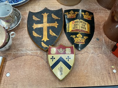 Lot 489 - Three painted armorial shields