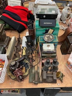 Lot 492 - Group of miscellaneous items to include a Bakelite hair dryer, military binoculars, flat irons, trenching tool and other items.