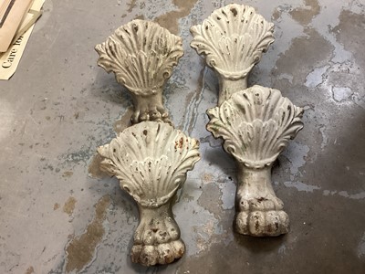 Lot 670 - Set four Victorian cast iron lions paw bath feet