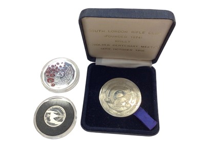 Lot 376 - South London Rifle Club silver medallion in fitted case, Elizabeth II 2019 50th Anniversary of Concorde's First Flight silver £1 coin and 2018 commemorative Flanders Fields £5 coin (3)