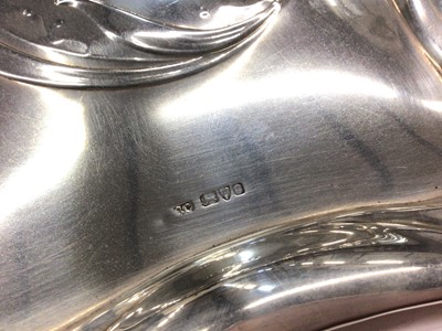 Lot 1097 - Art Nouveau silver tray with Mary and baby Jesus relief decoration, 31cm x 23cm