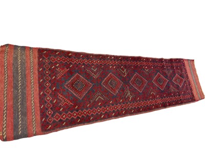 Lot 1383 - Eastern runner with five diamond medallions, 246 x 60cm