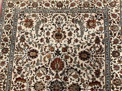 Lot 1385 - Kashan style rug, with meandering lotus flower ornament, 189 x 123cm and a pair of small eastern rugs