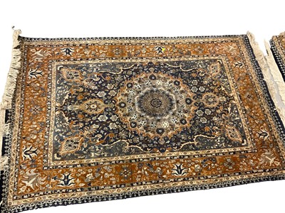 Lot 1392 - Near pair of Eastern rugs, each 197 x 123cm