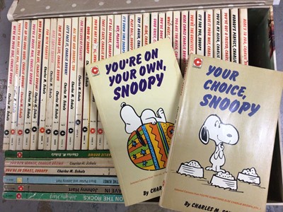Lot 584 - Collection of 37 Charles M Schulz Snoopy books together with three Johnny Hart books (40 total)
