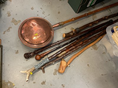 Lot 541 - Antique copper warming pan, together with a group of hunting walking sticks.