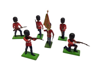 Lot 224 - Britains Deetail Trade Counter Box No.7250 with Scots Guards in five poses 10 standing firing, rifle poised & marching, 7 kneeling & 9 presenting arms, plus one colours bearer (37 total)