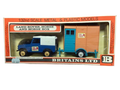 Lot 229 - Britains Landrover Horse Box No.9593 & No.9573, plus Tumbrel Cart No.9499 (x2), all boxed (4)