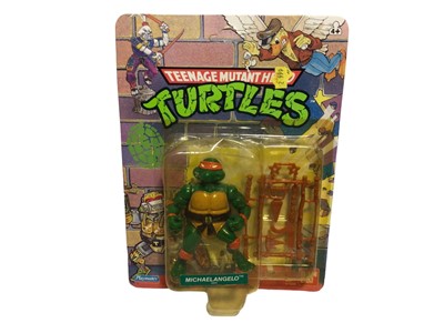 Lot 305 - Playmates Bandai Teenage Mutant Hero Turtles (1988-1989) Michael Angelo 5" action figure, on unpunched card with bubblepack (dented) No. 5004(1)