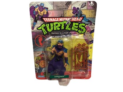 Lot 306 - Playmates Bandai Teenage Mutant Hero Turtles (1988-1989) Shredder 5" action figure, on unpunched card with bubblepack (dented & cracked) No. 5007 (1)