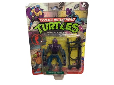 Lot 308 - Playmates Bandai Teenage Mutant Hero Turtles (1988-1989) Foot Soldier 5" action figure, on punched card with bubblepack (dented)  No. 5008 (1)