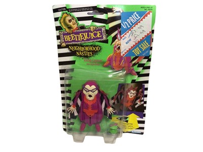 Lot 314 - Kenner BeetleJuice Neighbourhood Nasties (1990) Teacher Creature with Apple bomb, on punched card with bubblepack (dented) No.30210 (1)